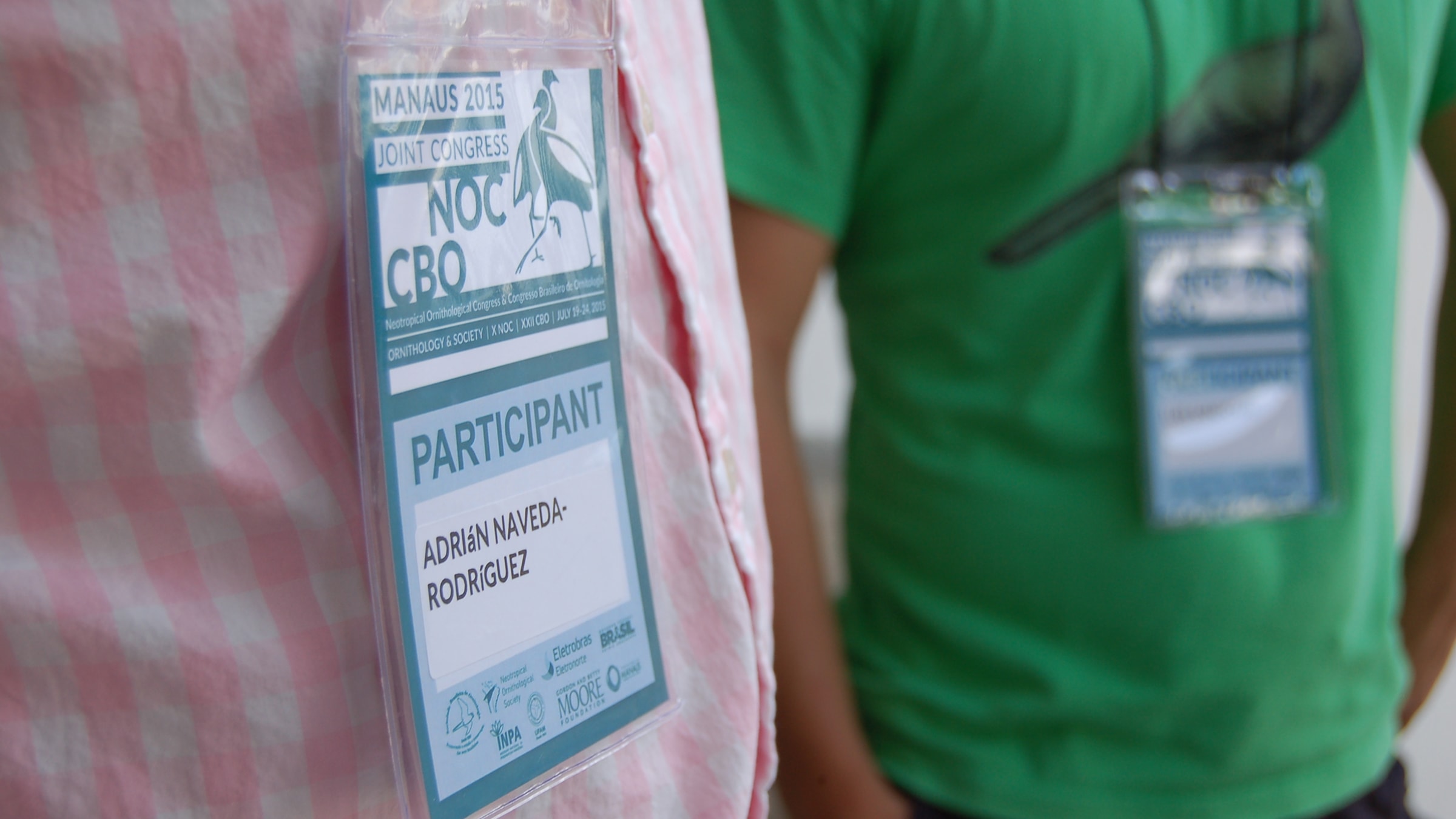 Color-coded attendee identification badges for varying levels of event access